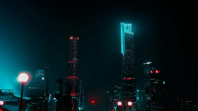 Stunning night view of Guangzhou's skyline with brightly lit skyscrapers creating a mesmerizing urban landscape.