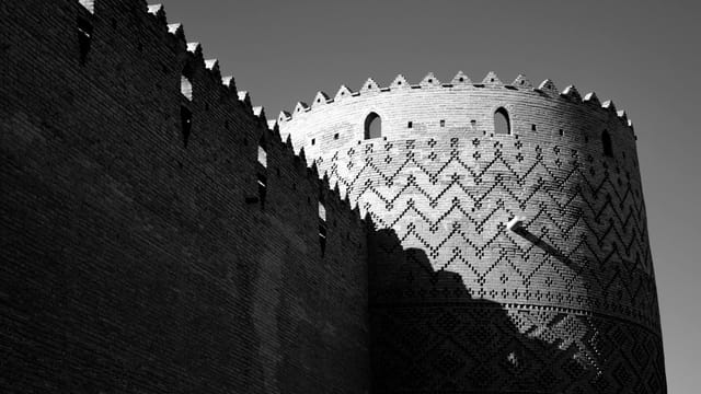 Dramatic black and white photo of Karim Khan Castle in Shiraz, Iran.