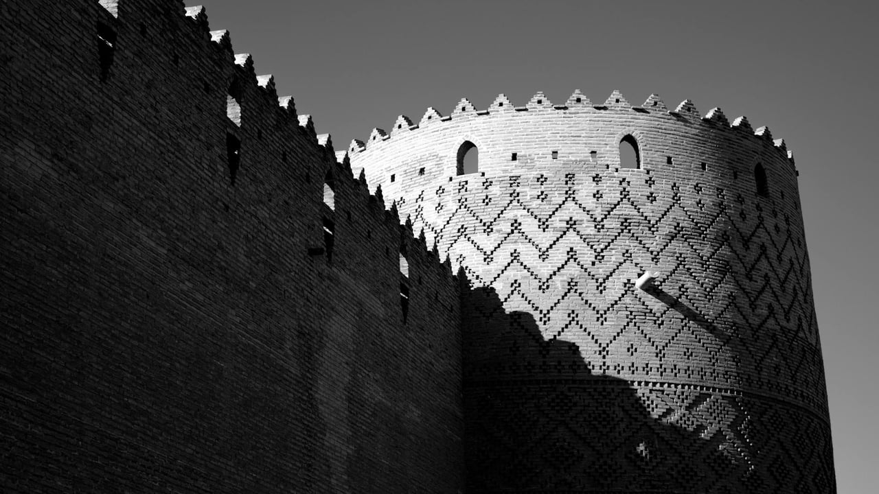 Dramatic black and white photo of Karim Khan Castle in Shiraz, Iran.