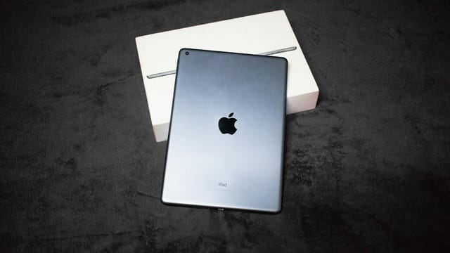High-quality image of an iPad with a box, perfect for product photography showcasing technology.