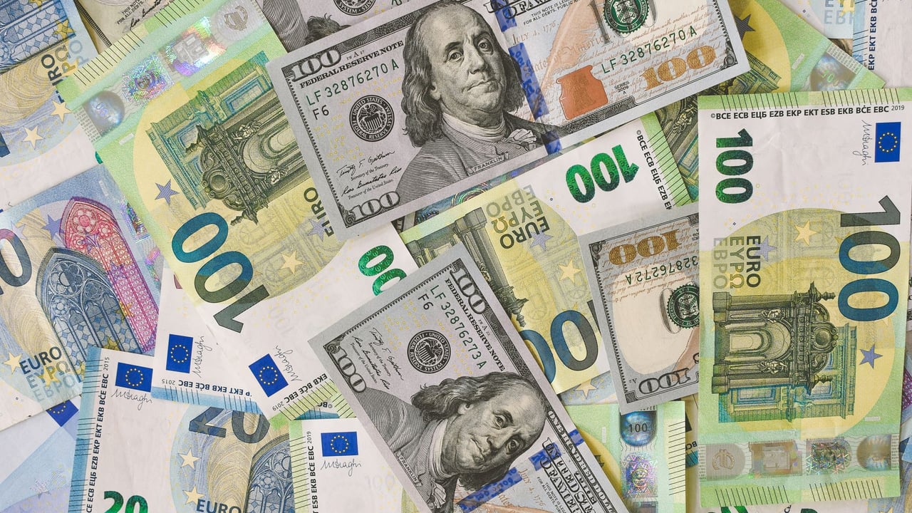 A detailed collage of Euro and Dollar banknotes showcasing international currency exchange.