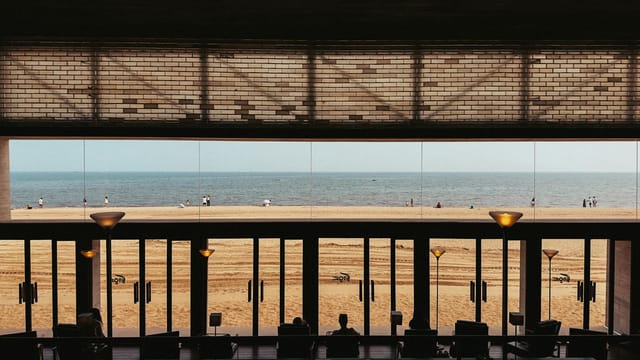 Stunning seaside view from a modern interior in Qin Huang Dao, China.