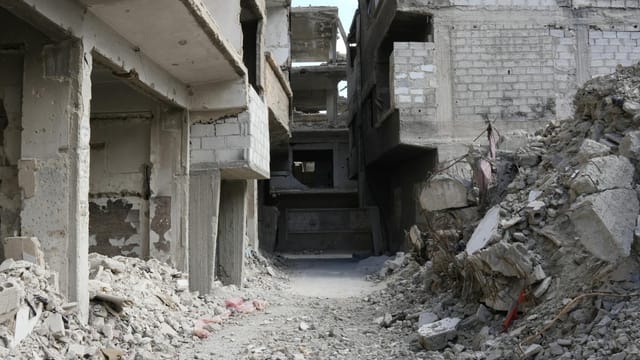 Abandoned and destroyed buildings in a war-torn area of Damascus, Syria.