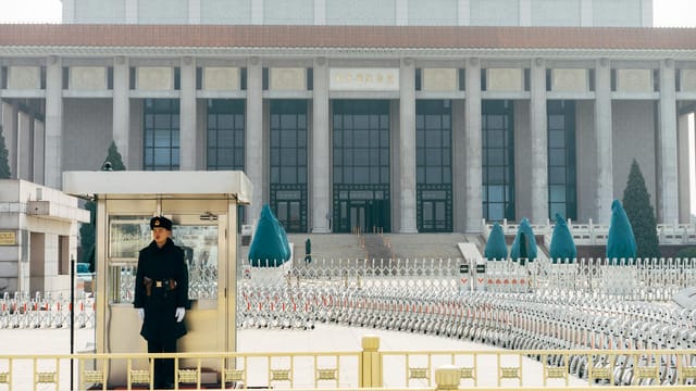 A soldier stands in guard post outside Chairman Mao Memorial Hall in Beijing, China.