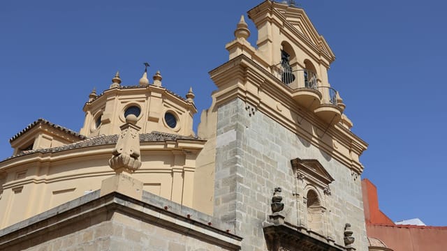 A beautiful architectural detail of a historic church in Jerez de la Frontera, Andalucía, capturing its intricate stonework.