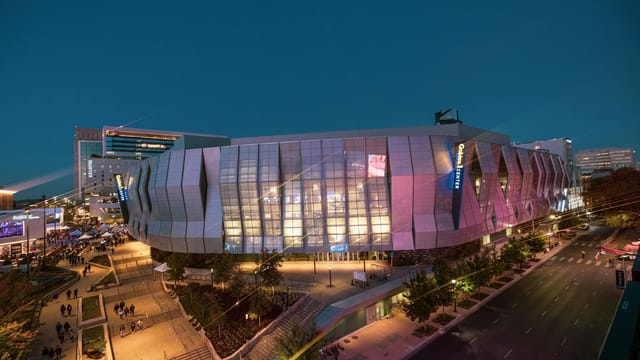 Stunning night view of the Golden 1 Center in Sacramento with vibrant lights.