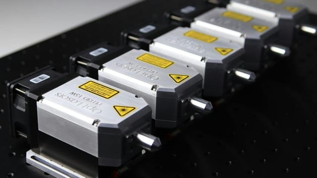 Close-up of aligned CNC laser modules, ideal for precision cutting and engraving.