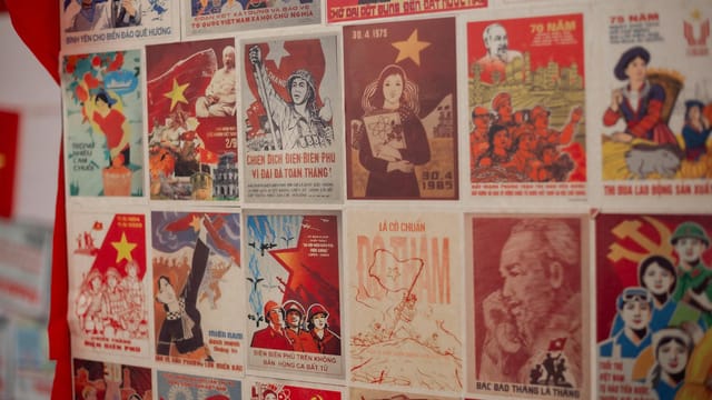 Colorful vintage Vietnamese propaganda posters showcasing historical themes and cultural art.