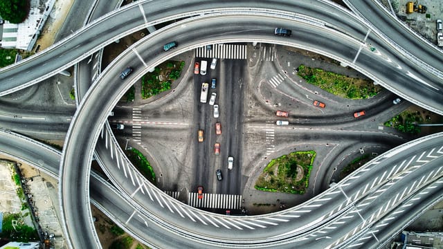 Drone shot of a complex highway interchange in Abidjan, showcasing modern urban infrastructure.