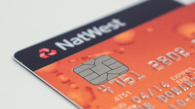 Detailed image of a NatWest credit card emphasizing the chip and card details.