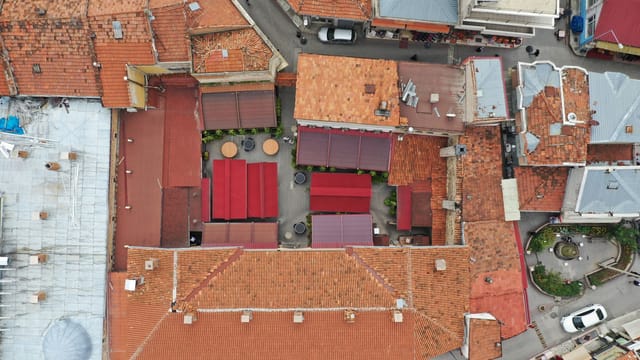 Aerial shot showcasing the historic architecture of Kastamonu, Türkiye with vibrant rooftops.