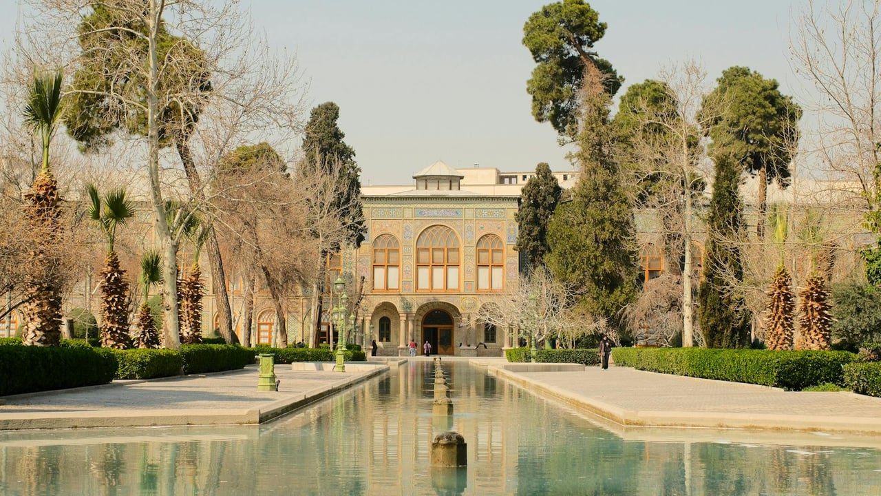 Explore Tehran's iconic Golestan Palace featuring a stunning reflection pool and Persian architecture.