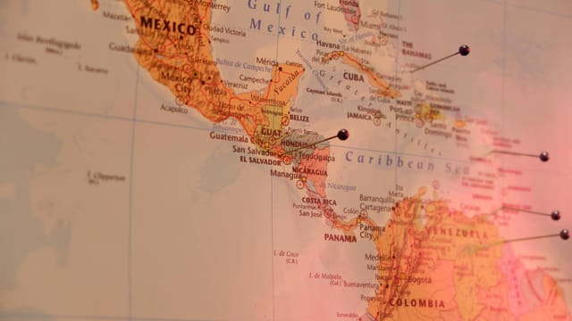 Close-up of a marked map of Central America, featuring countries like Mexico and Colombia.