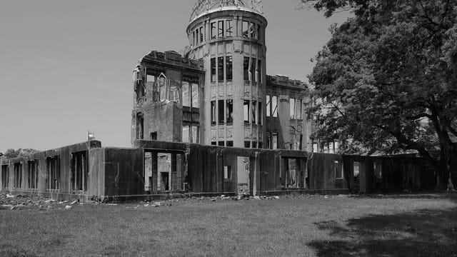 Black and white image of Hiroshima Peace Memorial symbolizing resilience.