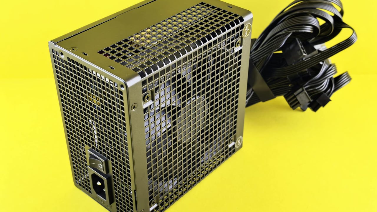 A powerful gaming PSU on yellow background, ideal for desktop setups.