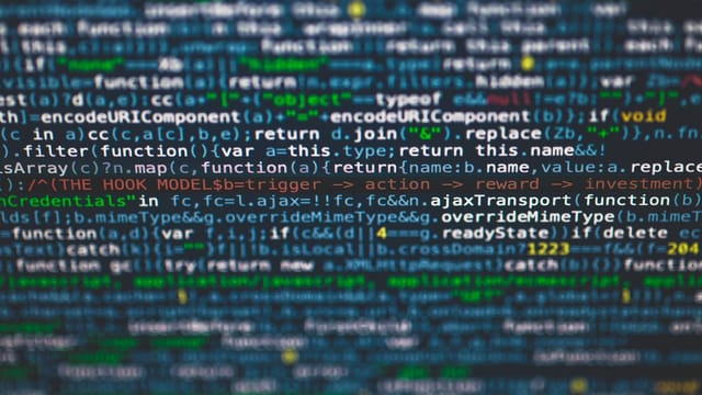 Detailed view of colorful programming code on a computer screen.