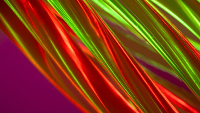 Abstract image featuring luminous red and green colors with a modern artistic style.