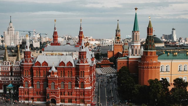 A stunning aerial view of Moscow featuring the State Historical Museum and the Kremlin.