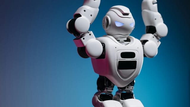 A white humanoid robot in a studio setting showcasing advanced robotics and modern technology.