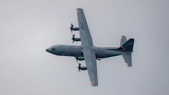 USAF Lockheed C-130 Hercules performing a flyover at Huntington Beach Airshow.