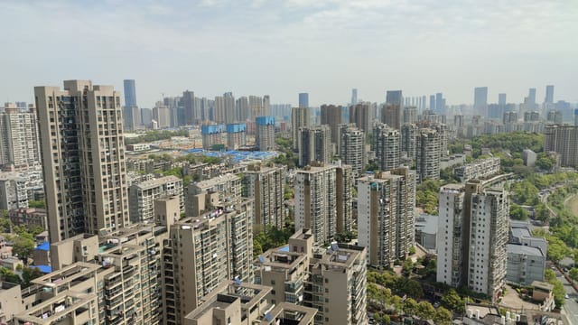 Aerial view of high-rise buildings in Changsha city, showcasing urban architecture and development.
