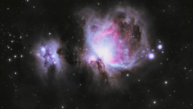 A breathtaking view of the Orion Nebula (M42) captured under the night sky in Aleh Negev, Israel.