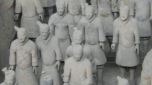 Terracotta Warriors in Xi'an, Shaanxi, China. Ancient army sculptures guarding Emperor Qin Shi Huang's tomb.