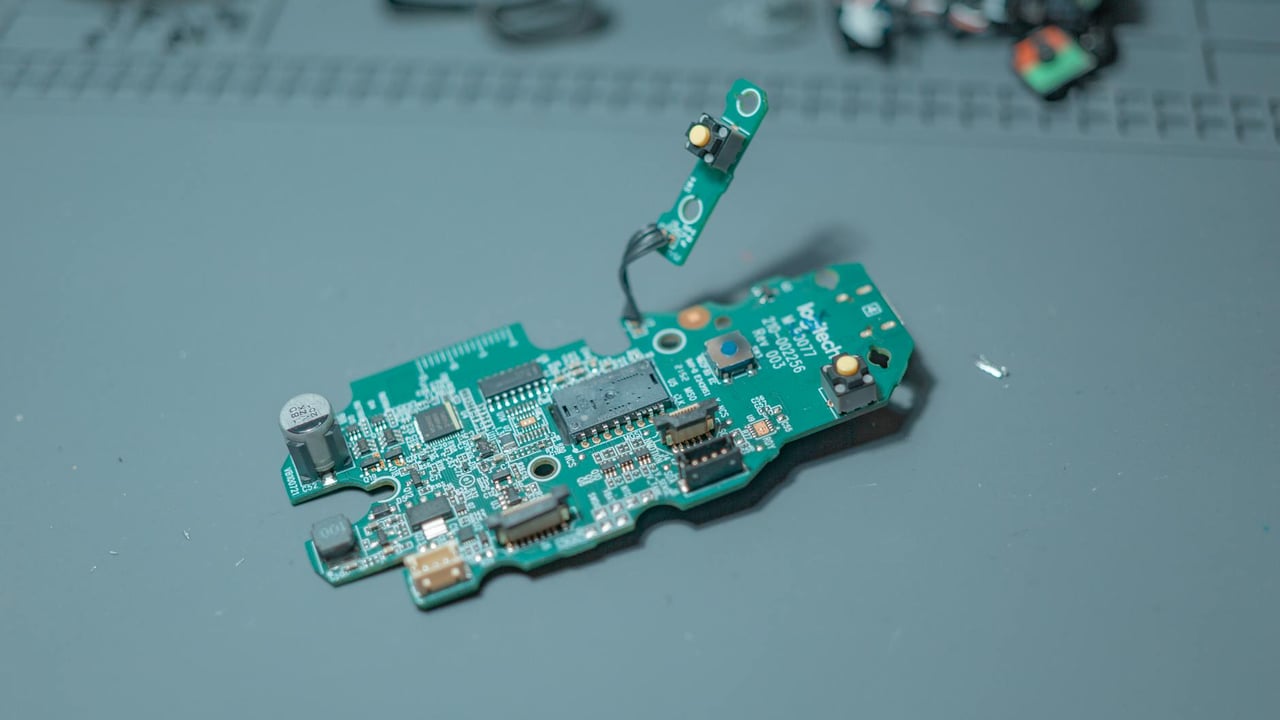 Detailed close-up of a circuit board showcasing intricate electronic components and wiring.