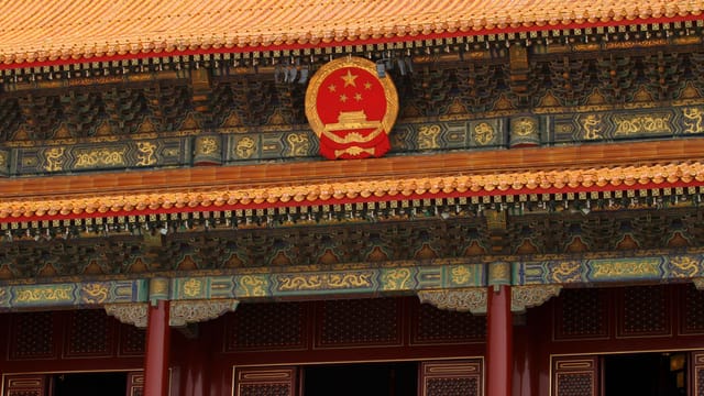 Close-up of the Forbidden City's ornate architecture in Beijing, showcasing traditional Chinese design.