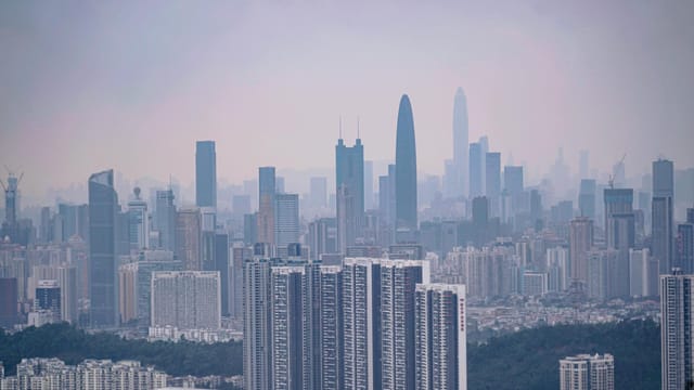 High-angle view of Shenzhen cityscape with skyscrapers during the day.