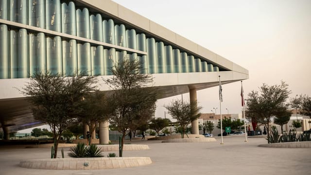 Modern architectural design of the National Library in Doha, Qatar.