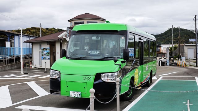 Green dual-mode vehicle at Kaiyō Station in Tokushima, Japan.