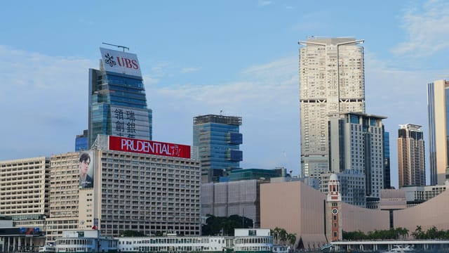 Stunning view of Hong Kong skyline featuring modern architecture and iconic landmarks.