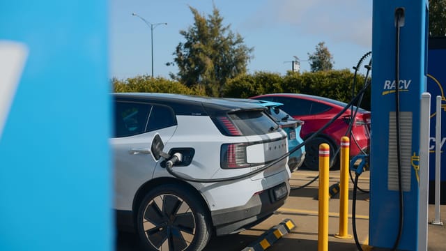 Electric vehicles charging at a RACV station in Barnawartha, VIC, Australia, promoting sustainable transportation.