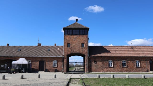 View of the main entrance of Auschwitz II-Birkenau in Brzezinka, Poland.