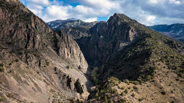 Breathtaking aerial view of Monroe, Utah's stunning canyons and mountainous landscape.