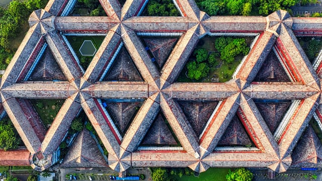 Intricate geometric aerial view of Bogor Agricultural University buildings in Jawa Barat, Indonesia.