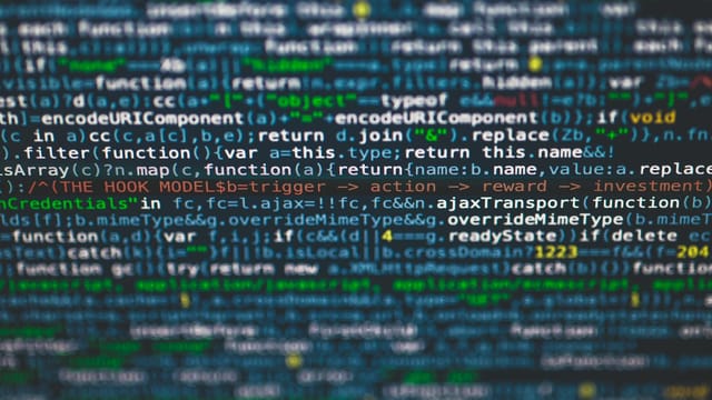 Detailed view of colorful programming code on a computer screen.