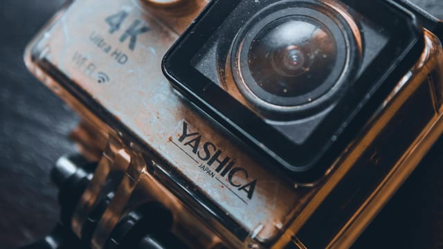 Detailed close-up of a vintage Yashica camera showcasing lens and design elements.