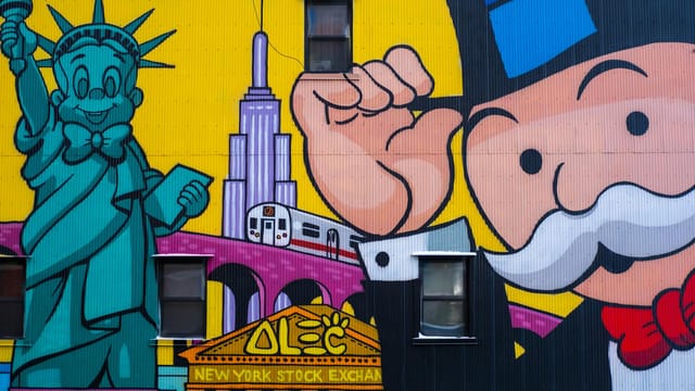 Vibrant mural in NYC featuring iconic landmarks and pop culture symbols.