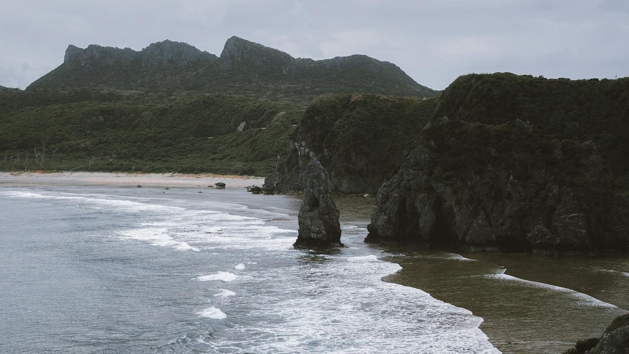 Explore the breathtaking cliffs and ocean waves along Okinawa's dramatic coastline in Japan.