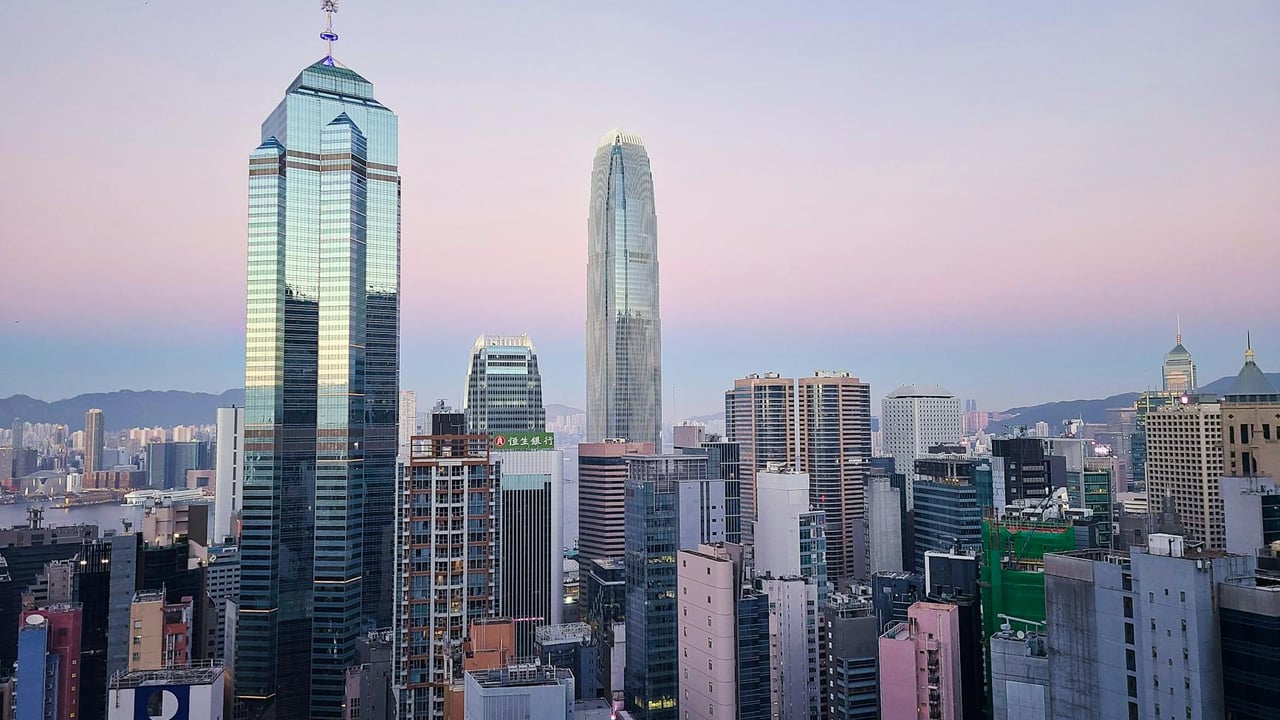 A stunning view of Hong Kong's skyscrapers and urban skyline at twilight.