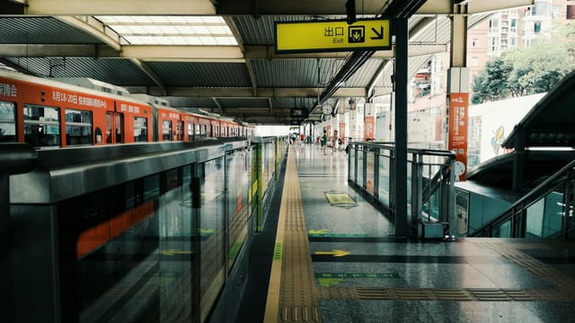 Chongqing railway platform showcasing public transportation and urban infrastructure.