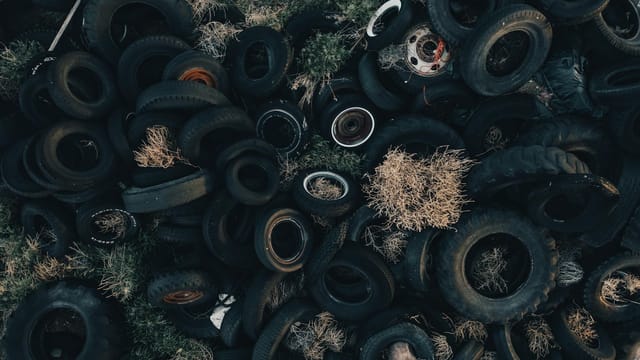 Aerial photograph of an abandoned tire dump in Monroe, Utah showcasing an environmental challenge.