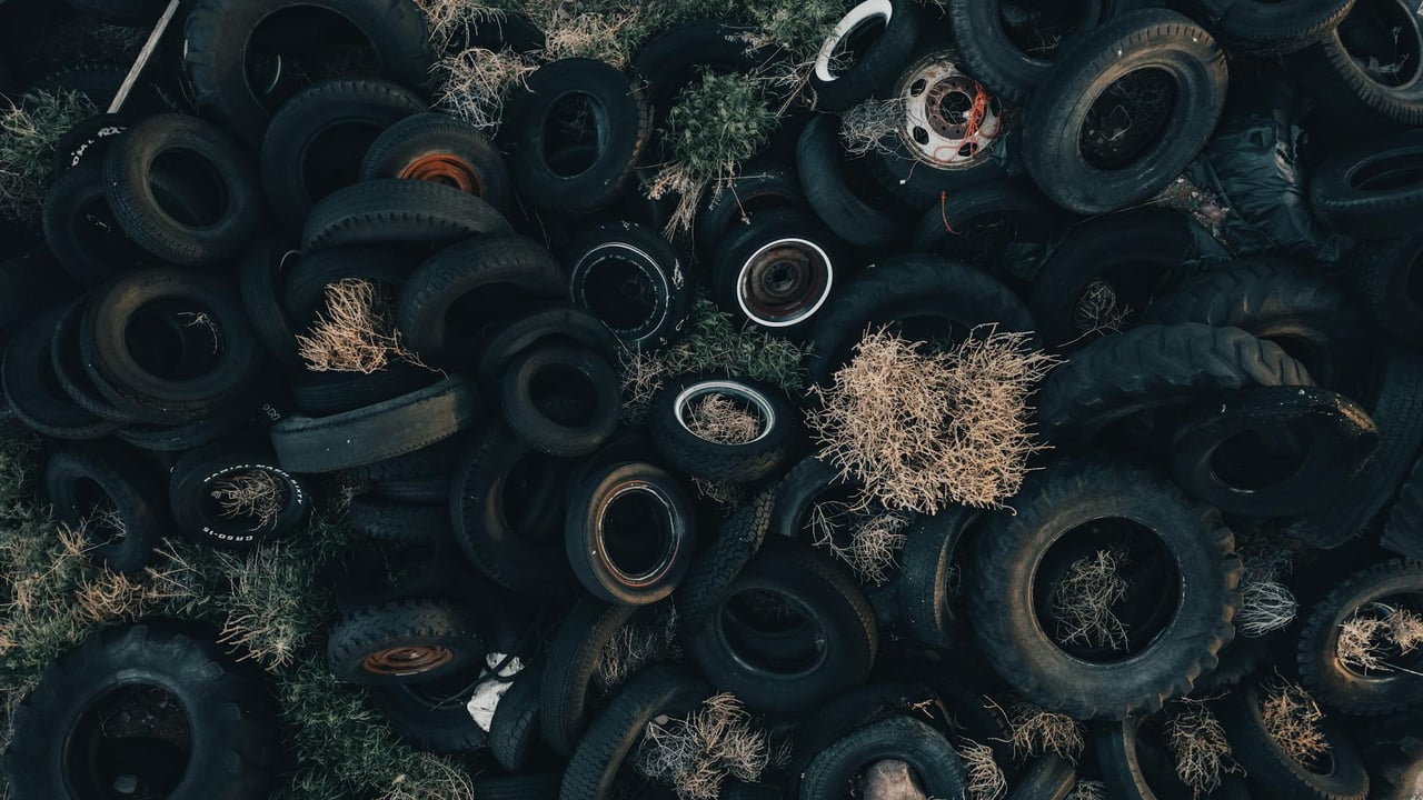 Aerial photograph of an abandoned tire dump in Monroe, Utah showcasing an environmental challenge.
