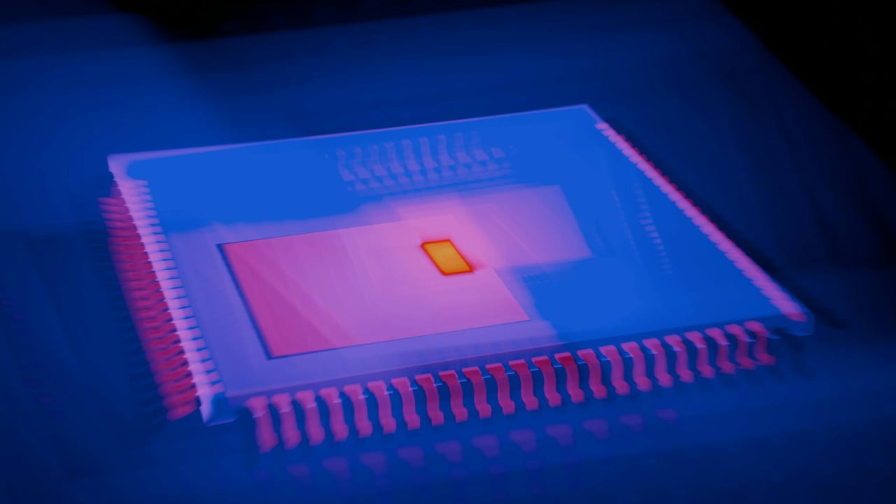 Blurred abstract image of a microchip with heatmap colors highlighting technological innovation.