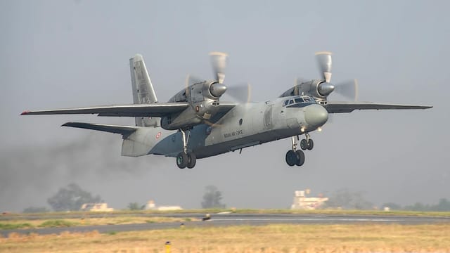 Indian Air Force aircraft in motion at Bengaluru airport, showcasing power and precision.