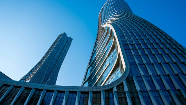 Modern skyscrapers of Hangzhou, Zhejiang, showcasing urban architectural elegance.