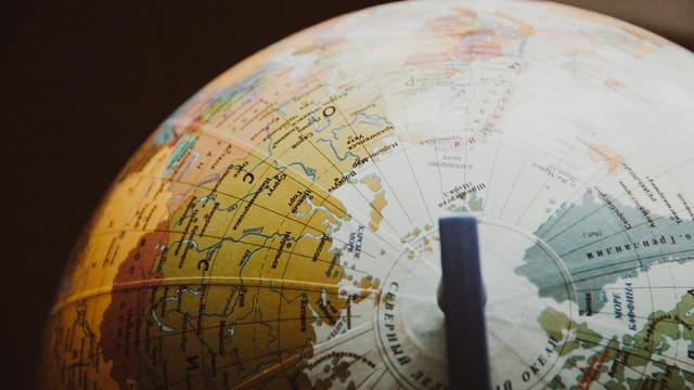 A detailed image of a globe highlighting various countries and regions.