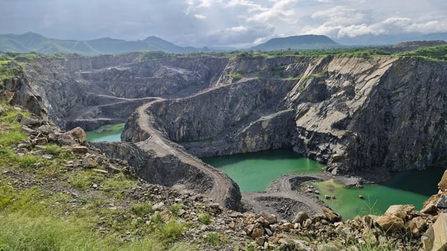 A breathtaking view of a quarry with emerald waters in Neem Ka Thana, Rajasthan.